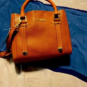 Cognac colored purse with gold accents